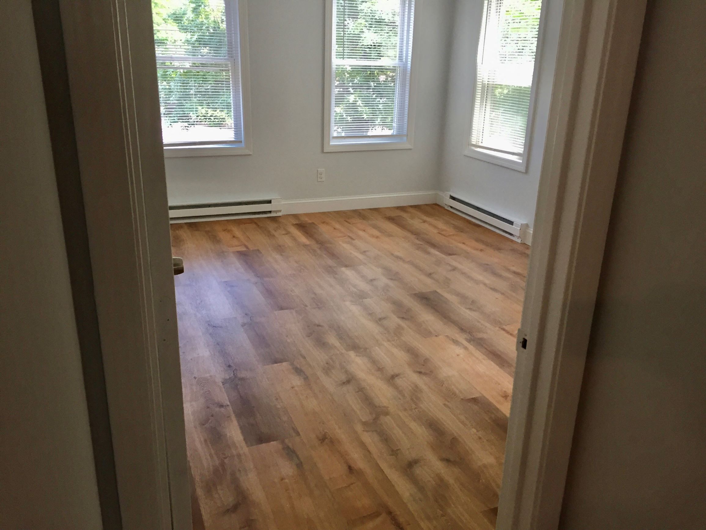Bedroom with laminate floors